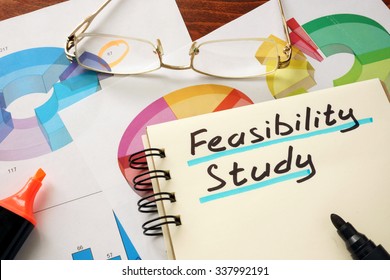 Notepad with feasibility study on a table. Business concept. - Shutterstock ID 337992191