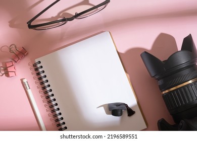 Notepad, Graduate Cap And Camera On Desktop Top View. Learning Photography Concept.