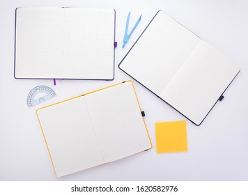 notepad or notebook paper at white background, top view - Powered by Shutterstock