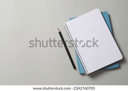 notepad on gray background, space for text