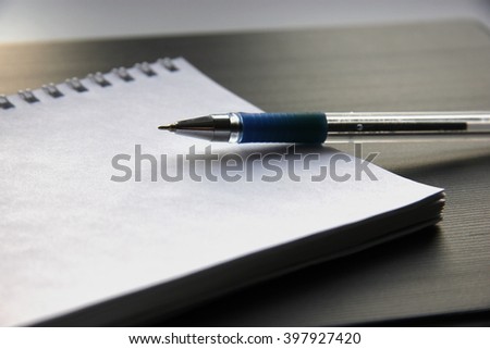 Notepad and pen 