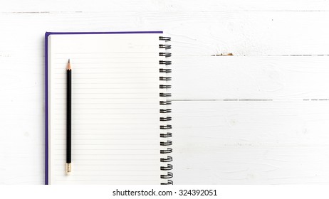 Notepad With Pen On White Table