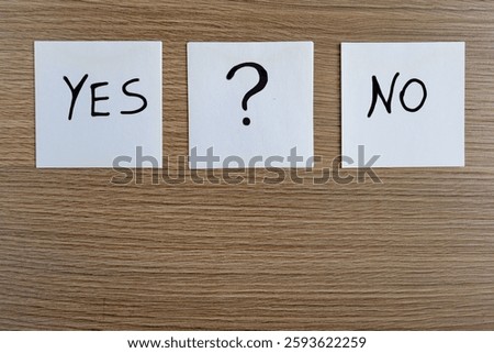 Notepad with question mark. Yes or no question.