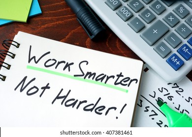 Notepad with sign Work Smarter Not Harder. - Shutterstock ID 407381461
