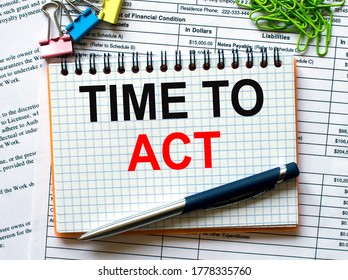 Notepad with text Time To Act on white background with paper clips and pen