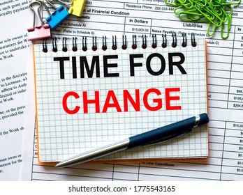 Notepad with text Time For Change on white background with paper clips and pen