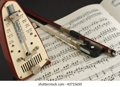 Notes and a cello bow