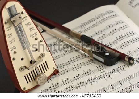 Notes and a cello bow
