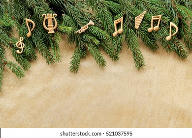 Notes, Music Instruments. Christmas Tree Brunch  On Golden Background 