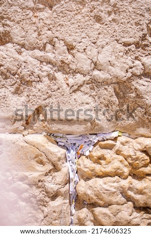 notes in the wailing wall strong plan. Jerusalem holy land. A famous pilgrimage site for Jews, Christians and Muslims. Judaism. Conversation with God. Fulfillment of desires tourism