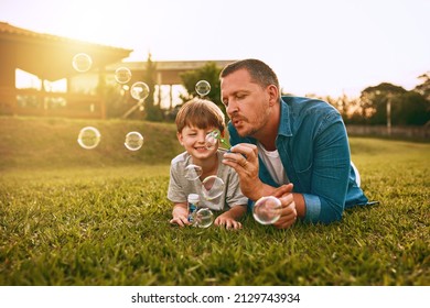 Nothing grows a father son bond like fun. Cropped shot of a young family spending time together outdoors.