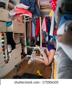 Nothing To Wear Concept, Young Woman Searching For Clothing In Walk In Closet