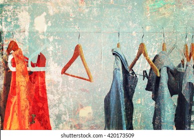 Nothing To Wear Pastel Color Female Clothes on Open Cloth Rail Wooden Hanger Grey Wall Vintage Shabby Effect