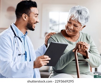 It was nothing to worry about. Shot of a young doctor sharing information from his digital tablet with an older patient. - Powered by Shutterstock