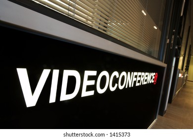 A Notice Against A Wall Of An Office That Reads:  Video Conference.