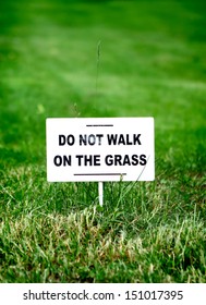 Notice Board On The Lawn With Text 