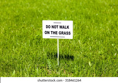 Notice Board On The Lawn With Text 