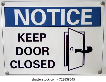 Notice: keep door closed signage.