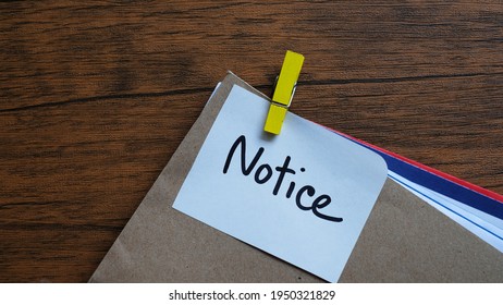 Notice message concept written post it on envelope. - Shutterstock ID 1950321829