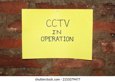 A notice on the wall, it provides an important message. The message is "CCTV in operation".