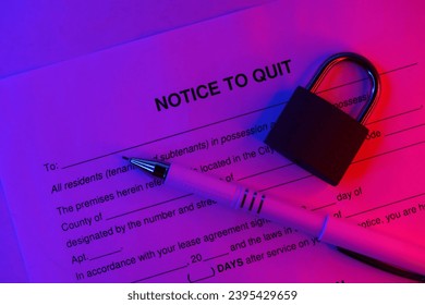 Notice to quit blank form with pen and small padlock on office table close up - Shutterstock ID 2395429659