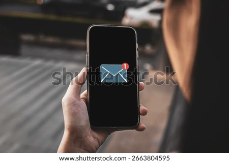 Notification of messages, emails on mobile screen. Concept of marketing and business by emails, newsletters, and online internet coordination