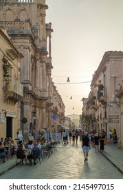 Noto, Italy - 29 June 2021 - A historical center view of the touristic baroque city in province of Siracusa, Sicily island, during the hot summer; UNESCO site in Val di Noto.