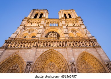 Notre Dame De Paris Cathedral, Illuminated Facade At Night