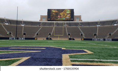 Notre Dame, IN / USA - June 11, 2018: A Notre Dame Football Player Plays Fortnite On The Videoboard At Notre Dame Stadium.