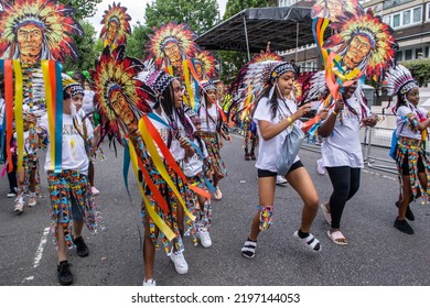 NOTTING HILL, LONDON, ENGLAND- 28 August 2022: Children In Costumes On The First Day Of Notting Hill Carnival 2022