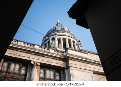 Nottingham City Centre, UK - December 12th 2020 view of council house dome roof looking up to blue sky dramatic angle