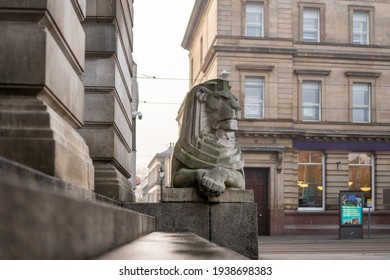 Nottingham City Centre, UK Jan 12th 2021 - Big magnificent royal stone lion statue Agamemnon Menelaus sandstone lions sculptures on steps of town hall council house market square