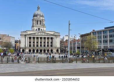 Nottingham, England – January 06, 2022: The Nottingham City Council House locate in Nottingham city centre adjacent to Old Market Square, while one of the city's modern trams passes near.