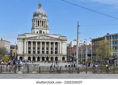 Nottingham, England – January 06, 2022: The imposing Nottingham Council House locate in Nottingham city centre adjacent to Old Market Square, while one of the city's modern trams passes near.