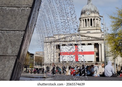Nottingham, UK, April 23, circa year: English flag set up on Nottingham's Council House to celebrate St George's Day. The Council house is shown in the background in front of water fountain.
