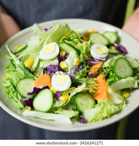 Nourish your body with this colorful salad featuring crisp cucumber, boiled eggs, purple cabbage, sweet corn, and crunchy carrots. A delicious and nutritious choice for a balanced diet! 🥗🌽🥕 #Health