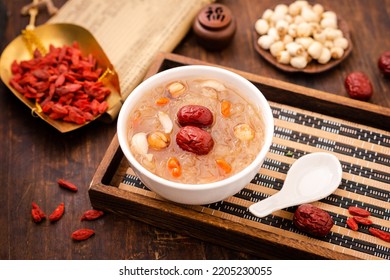 Nourishing red date, white fungus and lotus seed soup - Shutterstock ID 2205230055
