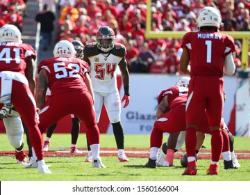 Nov 10, 2019; Tampa, FL USA;  Tampa Bay Buccaneers Outside Linebacker Lavonte David (54) Watches Arizona Cardinals Quarterback Kyler Murray (1).