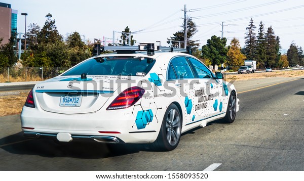Nov 11, 2019 Santa Clara / CA / USA - Mercedes
Benz self driving vehicle  performing tests on the streets of
Silicon Valley; Daimler and Bosch partnered to develop a fully
autonomous vehicle