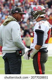 Nov 14, 2021; Landover, MD USA;  Tampa Bay Buccaneers Offensive Coordinator Byron Leftwich Talks With Quarterback Tom Brady (12) During An NFL Game At FedEx Field. (Steve Jacobson, Image Of Sport)