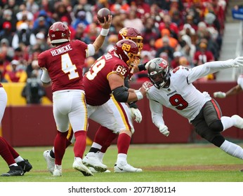 Nov 14, 2021; Landover, MD USA;  Washington Football Team quarterback Taylor Heinicke (4) throws a pass during an NFL game at FedEx Field. (Steve Jacobson, Image of Sport)