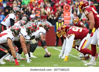 Nov 14, 2021; Landover, MD USA; A general view of the line of scrimmage with quarterback Tom Brady (12) of the Tampa Bay Buccaneers during an NFL game at FedEx Field. (Steve Jacobson, Image of Sport)