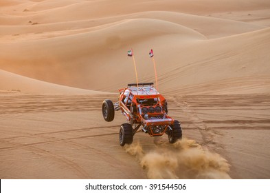 NOV 29 -DUBAI, UAE:  Dune Buggy Performs A Show For Tourist  On The  29th Of November 2013 In Dubai, UAE.The Dubai Desert Trip In Off-road Car Is Major Tourists Attraction, Dubai,