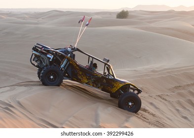 NOV 29 -DUBAI, UAE:  Dune Buggy Performs A Show For Tourist  On The  29th Of November 2013 In Dubai, UAE.The Dubai Desert Trip In Off-road Car Is Major Tourists Attraction, Dubai,