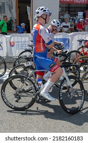 Nova Bana, Slovakia - July, 24, 2022 : Visegrad 4 Bicycle Race 2022. Group Of Cyclists Standing In Front Of The Start Line.