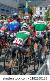 Nova Bana, Slovakia - July, 24, 2022 : Visegrad 4 Bicycle Race 2022. Group Of Cyclists Standing In Front Of The Start Line.