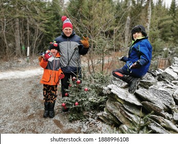 Nova Scotia, Canada - 1 January, 2021: Family enjoying the winter outdoors at a national park.