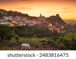 Novara di Sicilia, Italy village skyline on the island of Sicily at dusk.