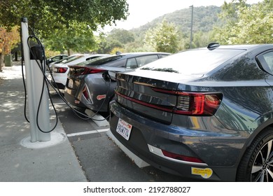 Novato, CA – August 17, 2022: A Group Of Electric Vehicles Recharge Their Batteries At A Charging Station.