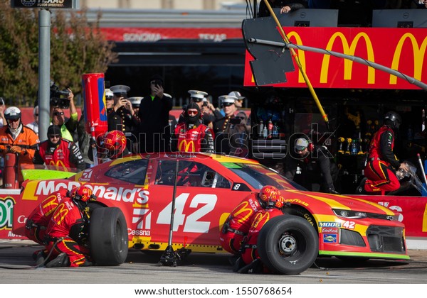 November 03, 2019 - Ft. Worth, Texas, USA: Kyle\
Larson (42) makes a pit stop for the AAA Texas 500 at Texas Motor\
Speedway in Ft. Worth,\
Texas.